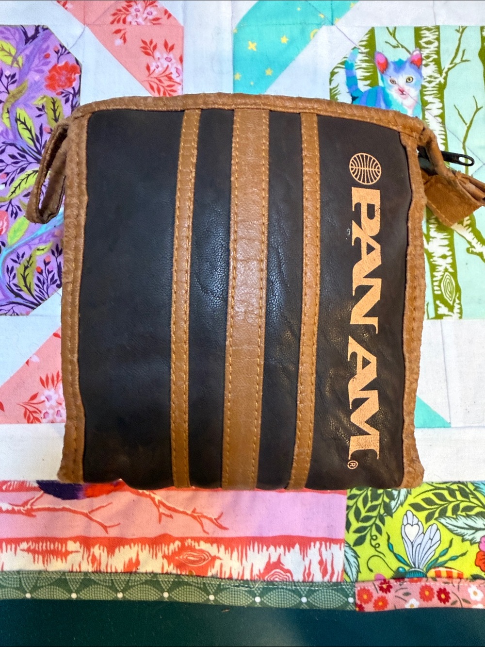 Brown and Black pan-am small leather zippered bag
